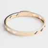 Bransoletka typu bangle z wycięciami z żółtego złota Bransoletka typu bangle z wycięciami z żółtego złota