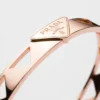 Bransoletka typu bangle z wycięciem z wiecznego złota w kolorze różowym Bransoletka typu bangle z wycięciem z wiecznego złota w kolorze różowym