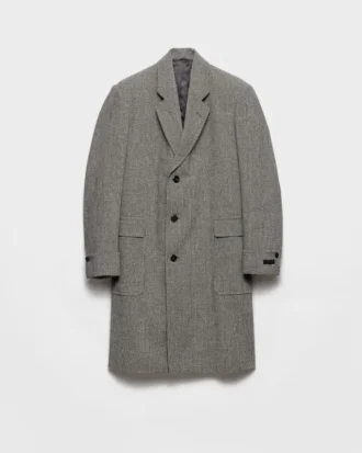 Jednorzędowy wełniany płaszcz w kratę typu houndstooth Jednorzędowy wełniany płaszcz w kratę typu houndstooth