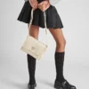 Mała wyściełana torba na ramię Prada Traveller z Re-Nylonu Mała wyściełana torba na ramię Prada Traveller z Re-Nylonu