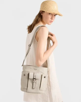 Mini torebka typu bucket Prada Route z płótna i skóry