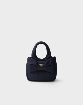 Mini wyściełana torba Re-Nylon z kokardką Mini wyściełana torba Re-Nylon z kokardką