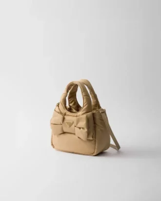 Mini wyściełana torba Re-Nylon z kokardką Mini wyściełana torba Re-Nylon z kokardką