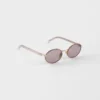 Okulary przeciwsłoneczne Prada z kultową metalową plakietką Okulary przeciwsłoneczne Prada z kultową metalową plakietką