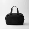 Torba podróżna z nylonu Re-Nylon i skóry Saffiano Torba podróżna z nylonu Re-Nylon i skóry Saffiano