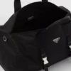 Torba podróżna z nylonu Re-Nylon i skóry Saffiano Torba podróżna z nylonu Re-Nylon i skóry Saffiano