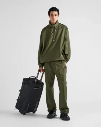 Walizka na kółkach z tkaniny Re-Nylon i skóry Saffiano