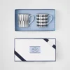 Zestaw dwóch porcelanowych kubków – szachownica i paski Zestaw dwóch porcelanowych kubków – szachownica i paski