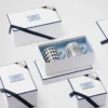 Zestaw dwóch porcelanowych kubków – szachownica i paski Zestaw dwóch porcelanowych kubków – szachownica i paski