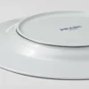 Zestaw dwóch porcelanowych talerzy obiadowych – szachownica Zestaw dwóch porcelanowych talerzy obiadowych – szachownica