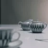Zestaw porcelanowego dzbanka na mleko i cukiernicy – paski Zestaw porcelanowego dzbanka na mleko i cukiernicy – paski
